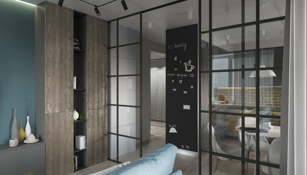 Вид из гостиной на прихожую и кухню.