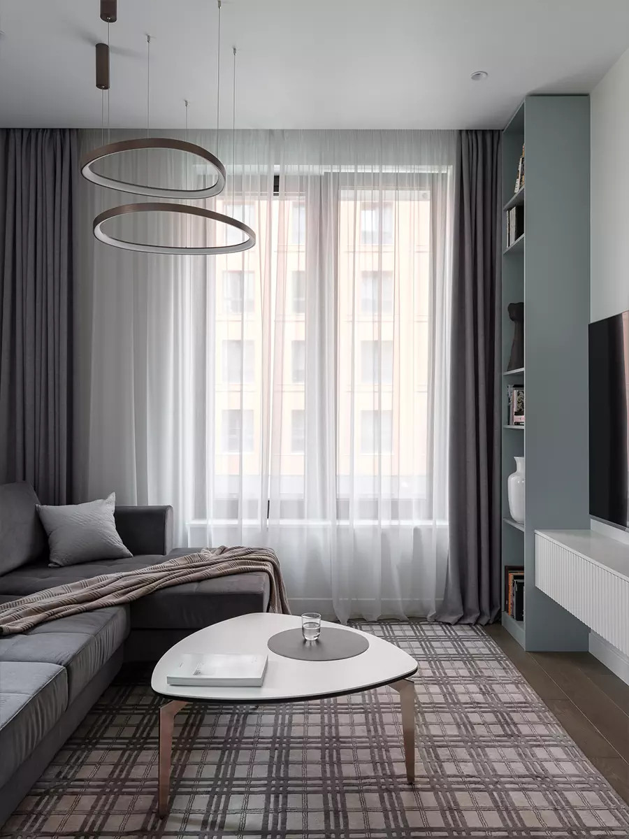 Обложка проекта: Лаконичный интерьер квартиры с коврами ручной работы