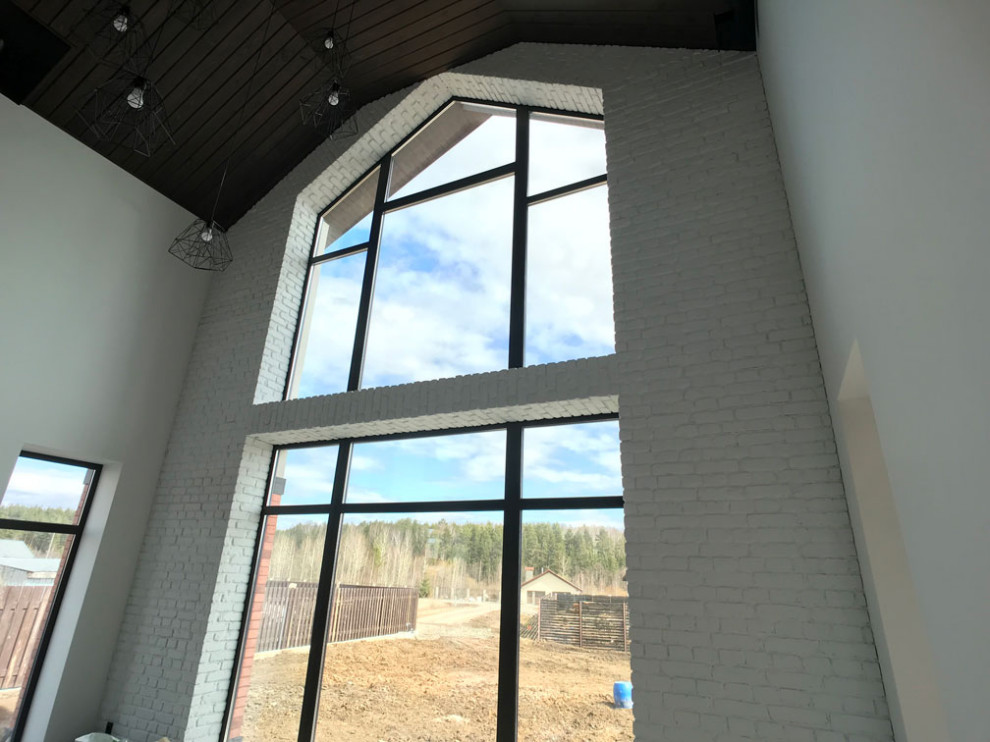 Обложка проекта: Декоративный кирпич БауЭко Bianko в интерьере гостиной