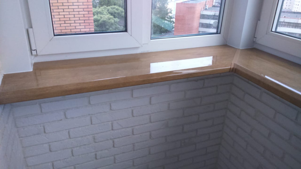 Замена остекления, утепление и отделка балкона декоративным камнем