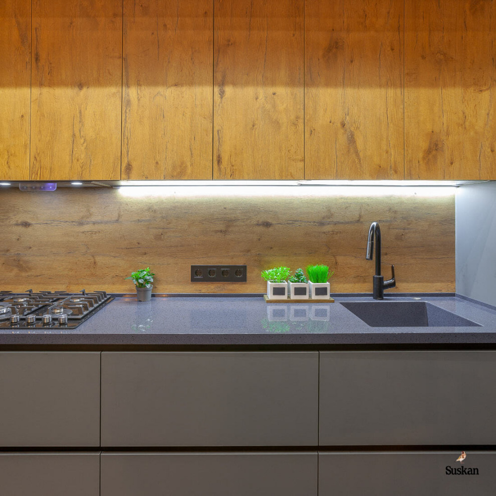 Интегрированная в столешницу каменная мойка