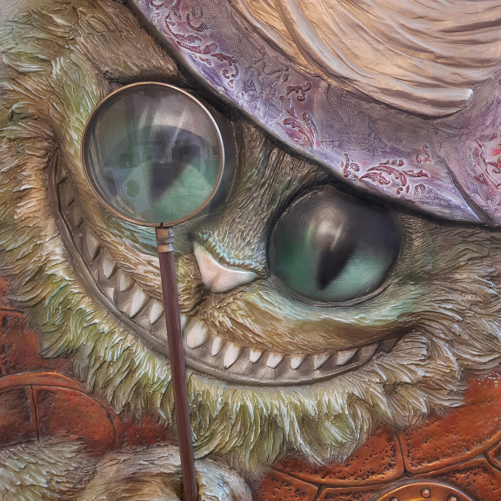 Обложка проекта: чеширский кот барельеф на стену