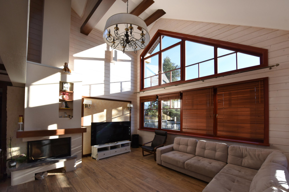 Реализованные проекты интерьеров в домах их клееного бруса