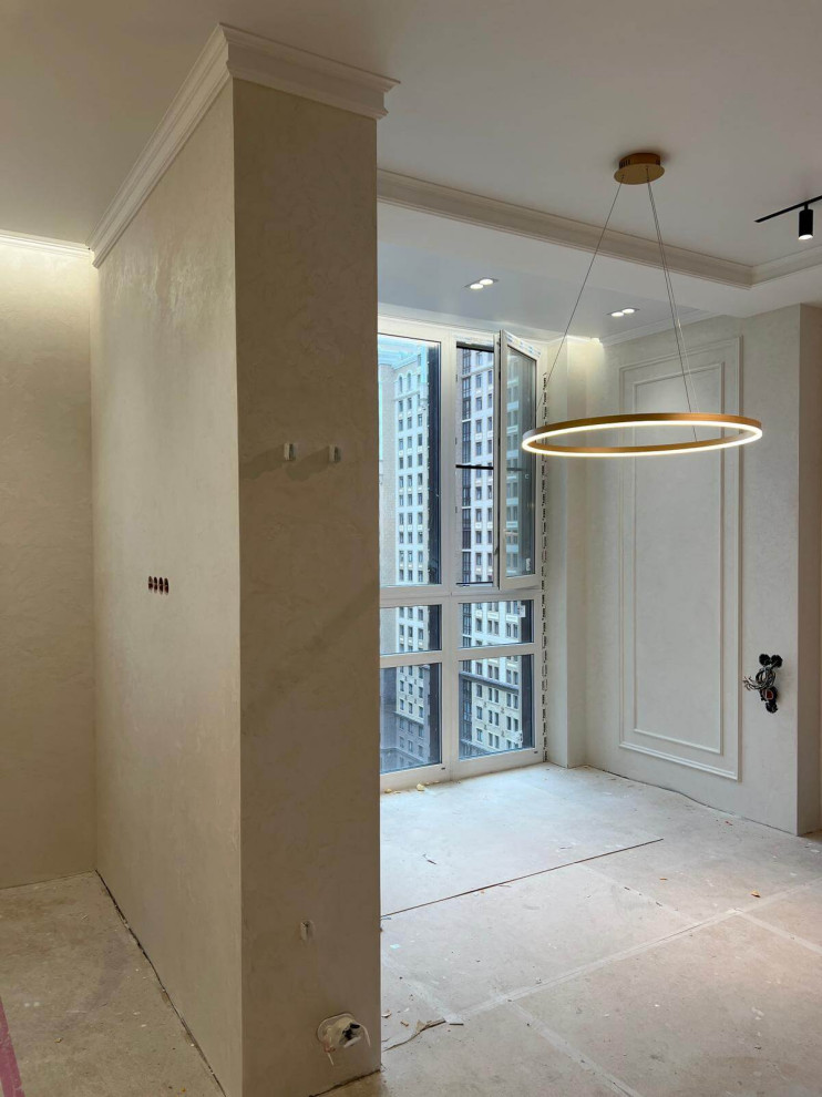 Отделка квартиры фактурной штукатуркой с декоративными рамками