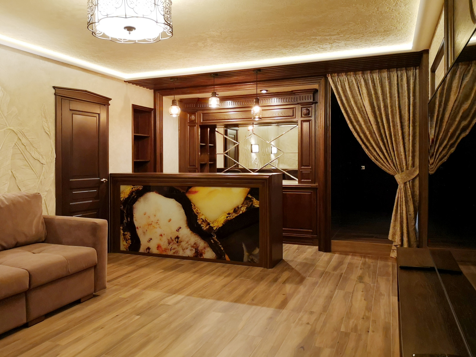 Фото готового интерьера. Цокольный этаж загородного дома, зона для отдыха