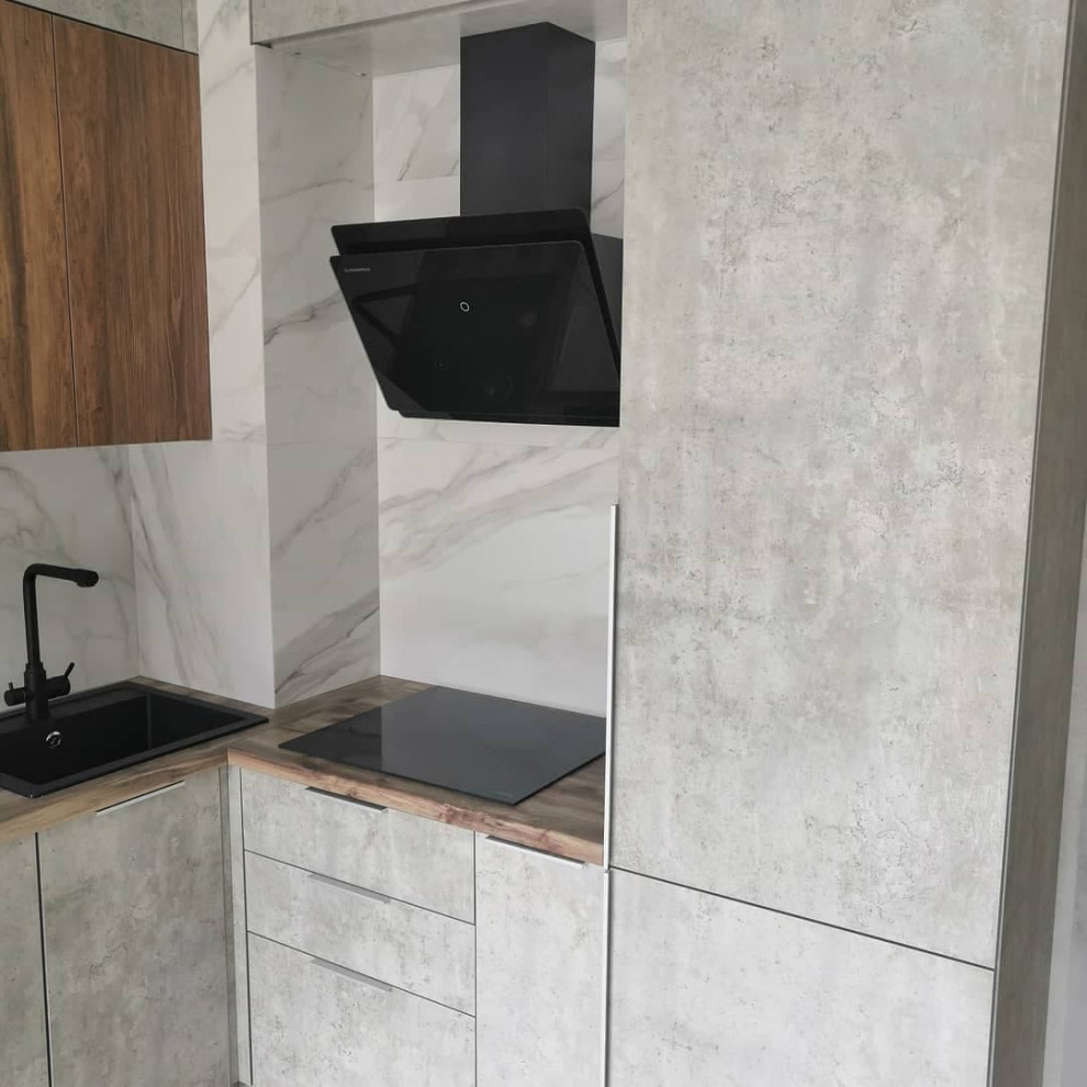 Маленькая угловая кухня для студии в стиле лофт