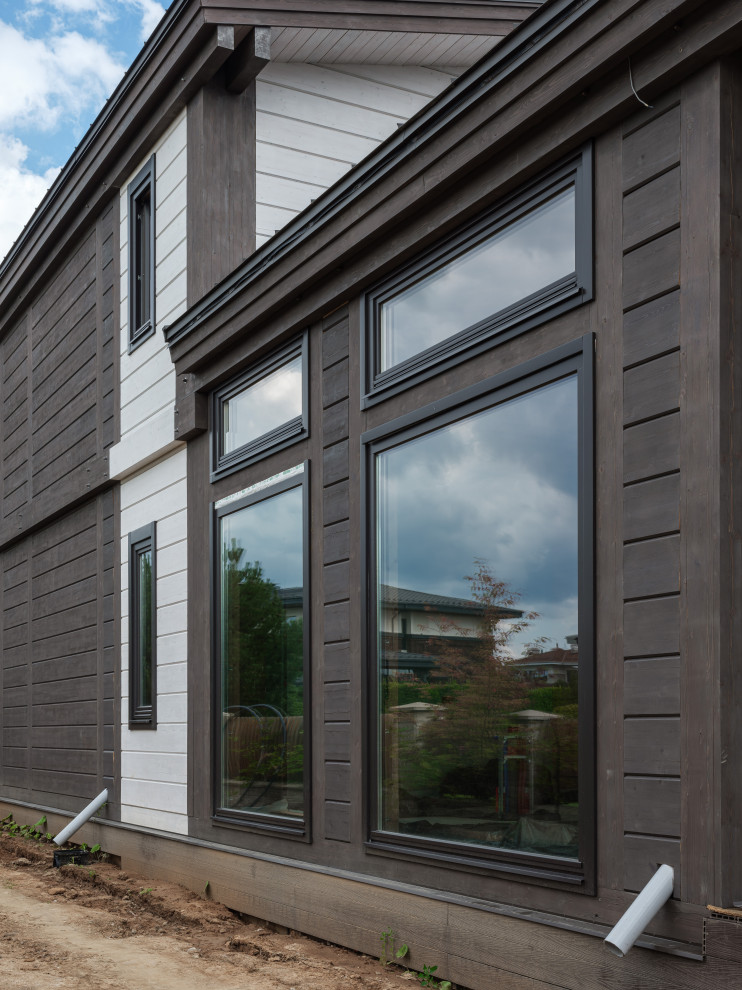 Трапецевидные окна, порталы и входные двери для современного дома