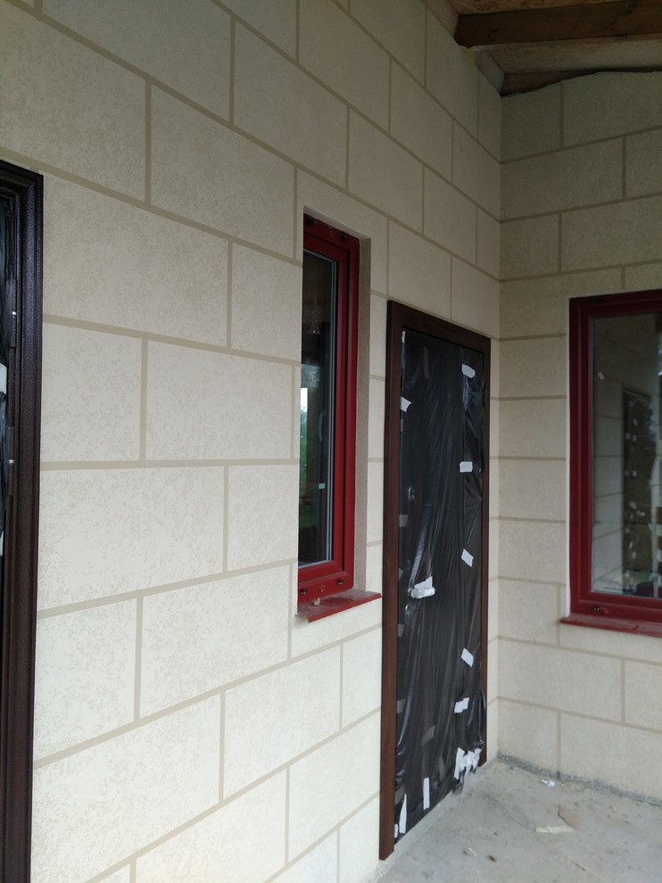 Изготовление фасада из декоративной штукатурки в Кириши