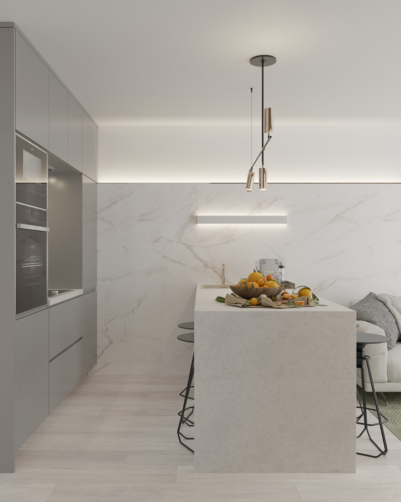 Дизайн интерьера маленькой кухни с барной стойкой, диваном и ТV зоной.