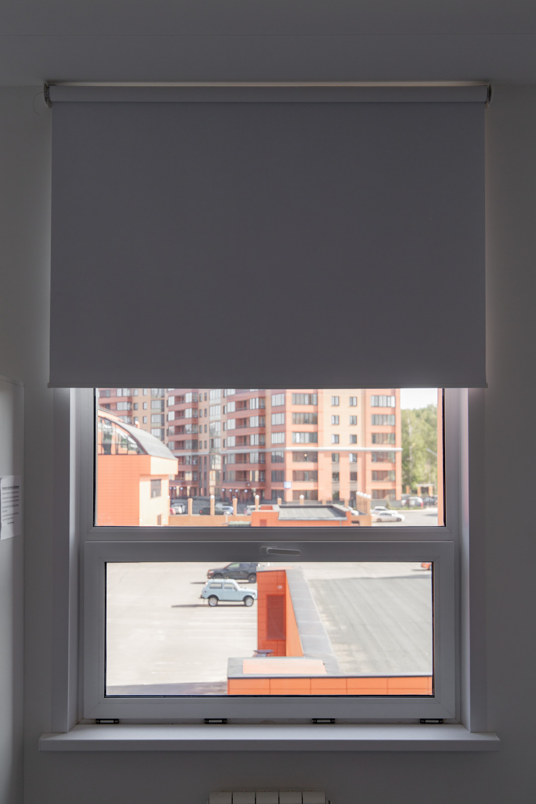 Рулонные шторы с тканью блэкаут