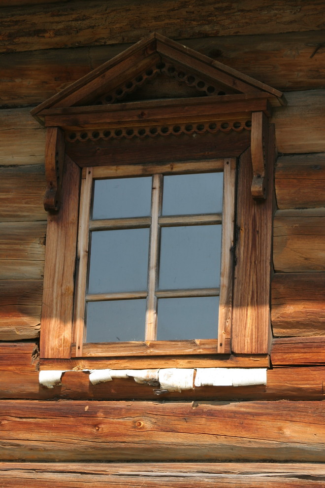 Защитить и украсить: Зачем деревянному дому — резьба