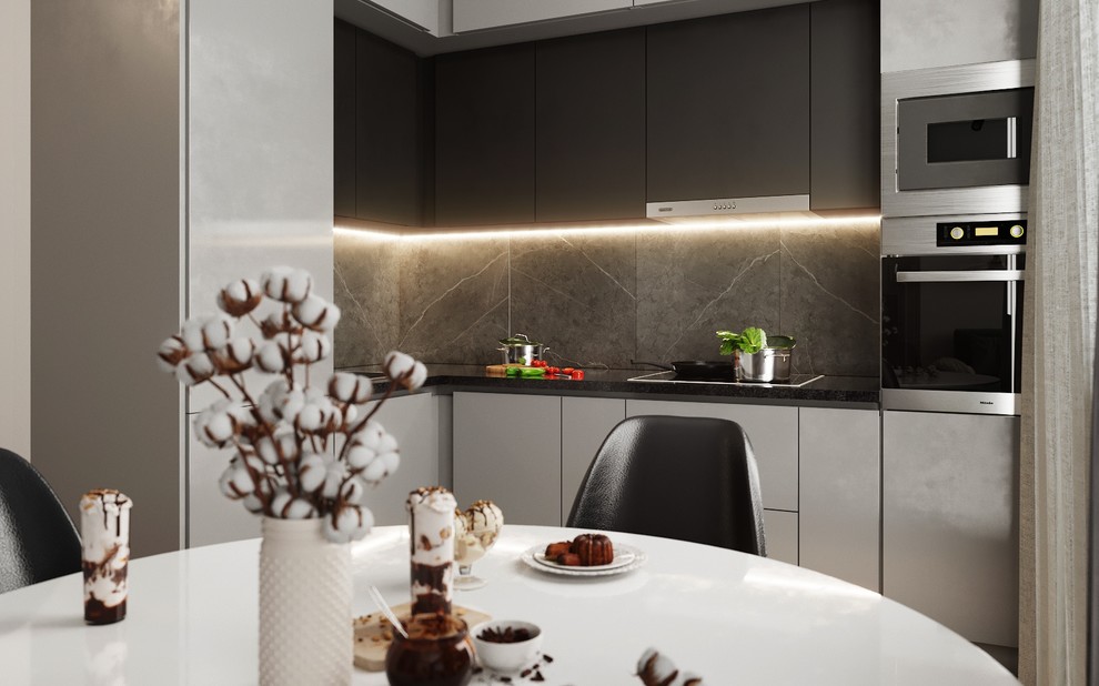 Кухонный гарнитур обыгран формой чёрного квадрата, вся необходмая техника размес