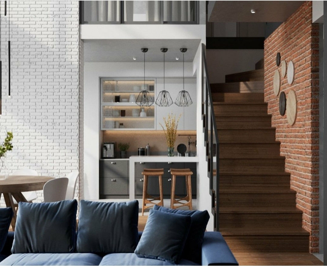 Антуражная кухня-гостиная в стиле лофт в двухуровневой квартире