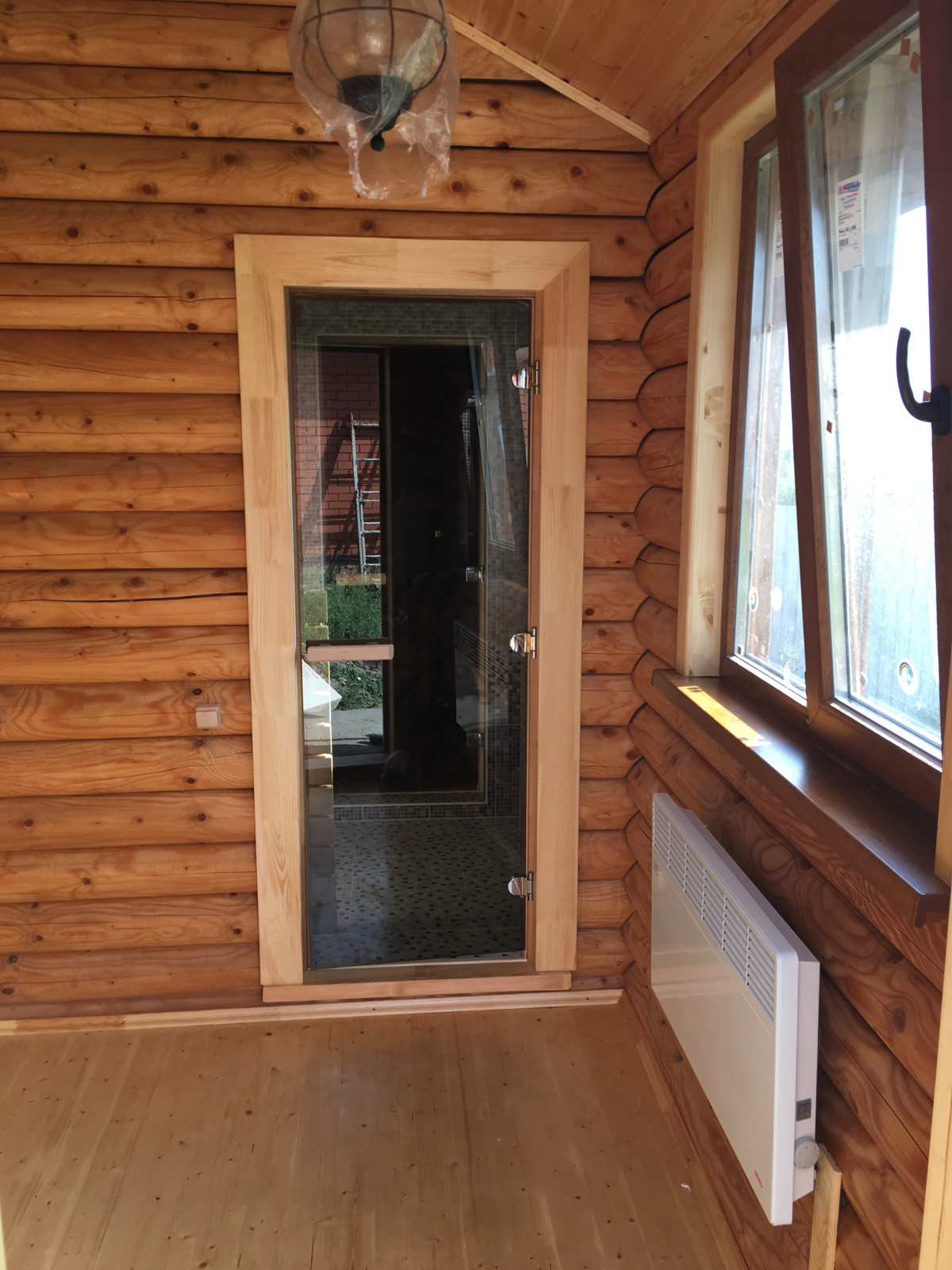 Отделка бани из сруба