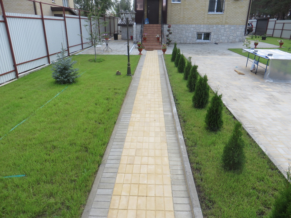 Укладка тротуарной плитки фото