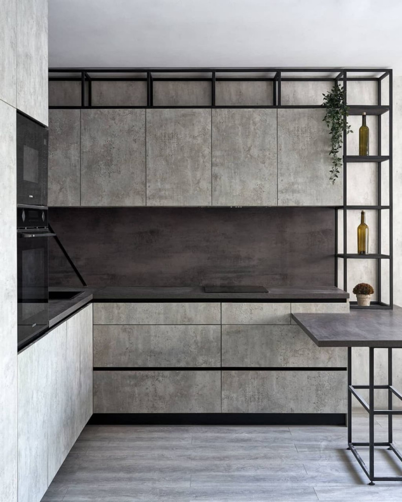 Дизайнерская угловая кухня серого цвета в стиле лофт с барной стойкой