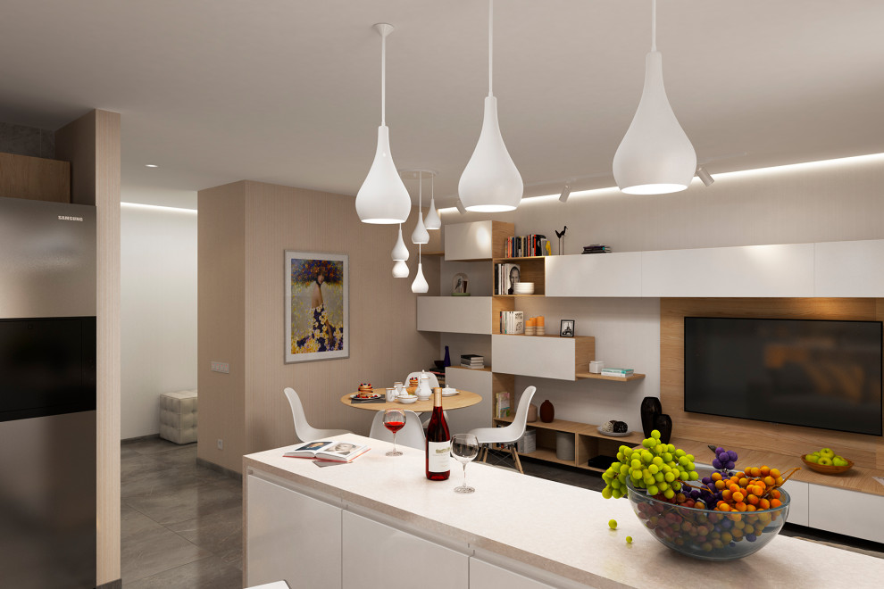 Объединенные в единое пространство кухня, столовая, гостиная.