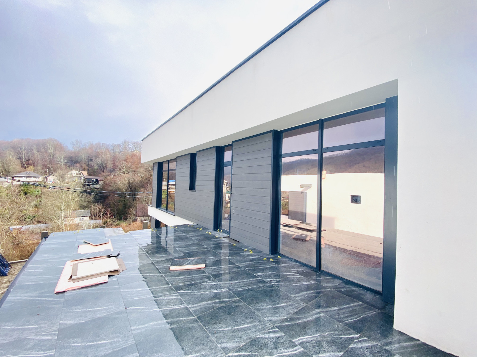 Отделка фасадов коттеджного поселка