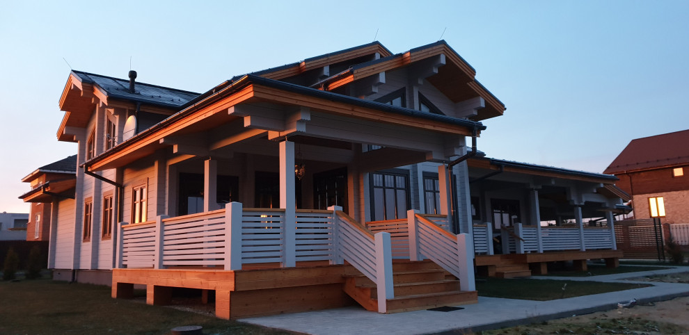 Дом из клееного бруса с навесом для машин 426 м.кв.