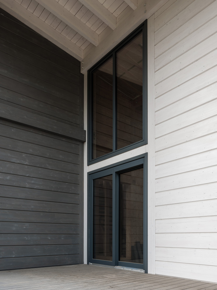 Трапецевидные окна, порталы и входные двери для современного дома