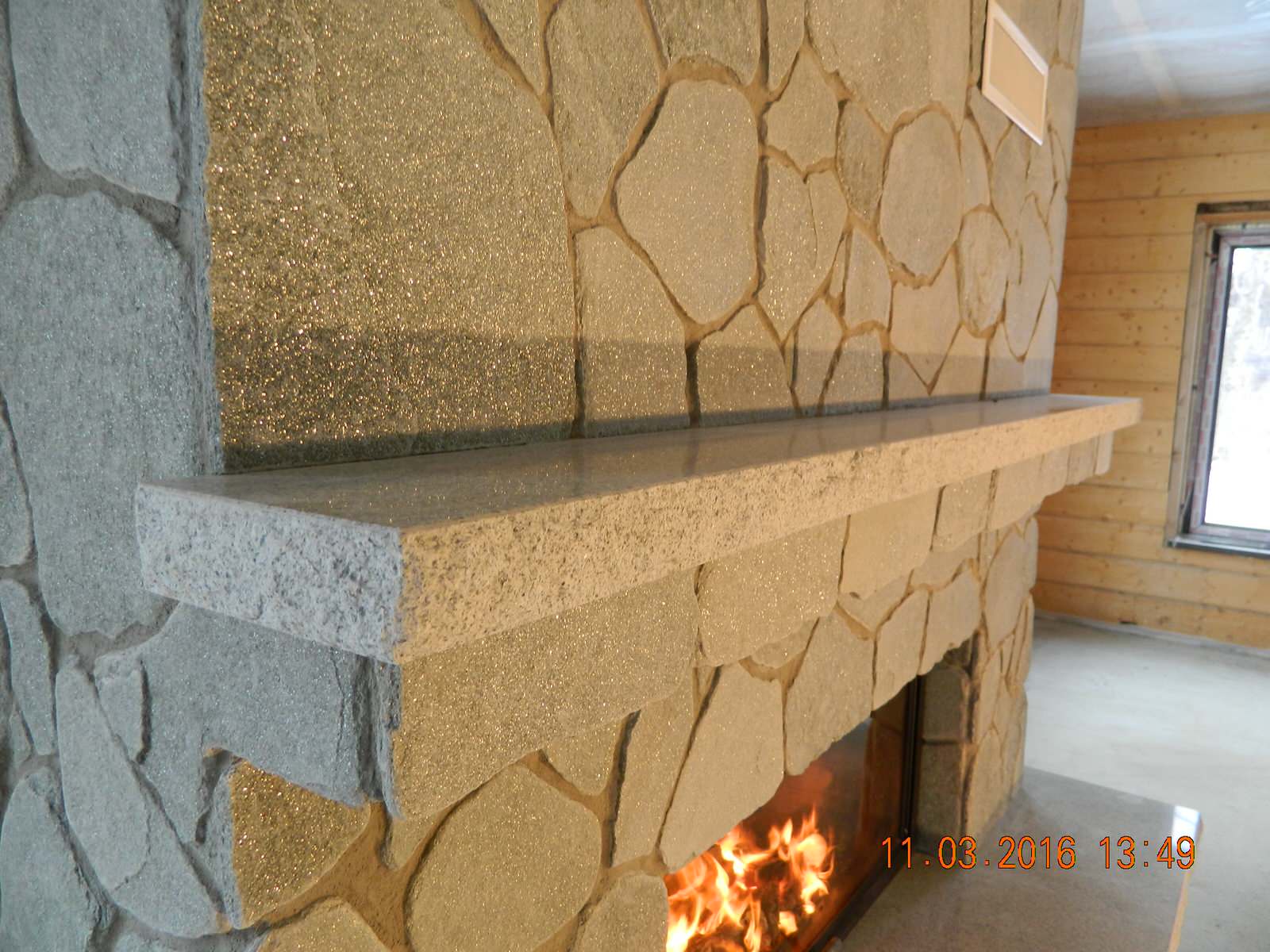 Камин в натуральном камне
