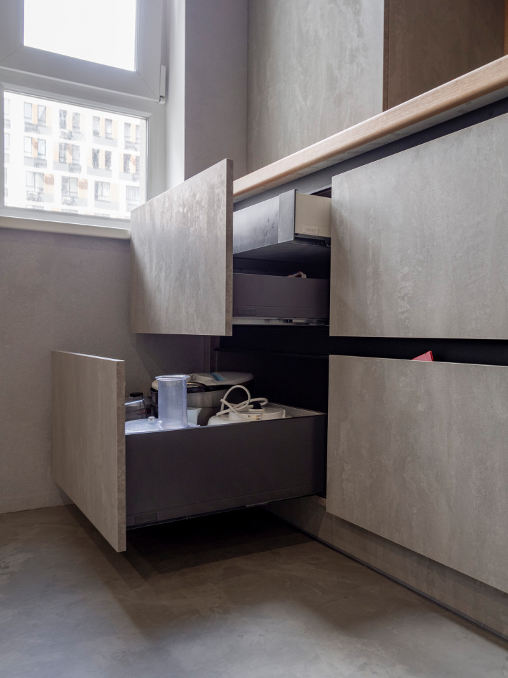 Элегантная минималистичная кухня в сером цвете