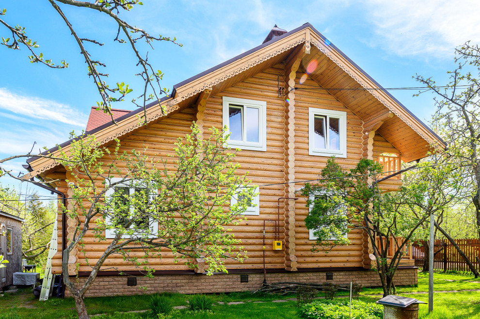 отделка дома из оцилиндрованного бревна