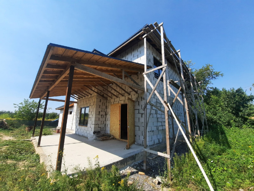 Двухэтажный коттедж из газобетонного блока с гаражем, 127 кв.м.