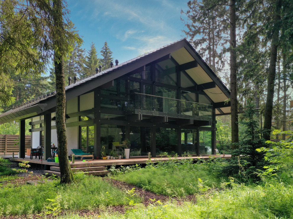 Дом по проекту Альпы 280м² с панорамным остеклением и вторым светом