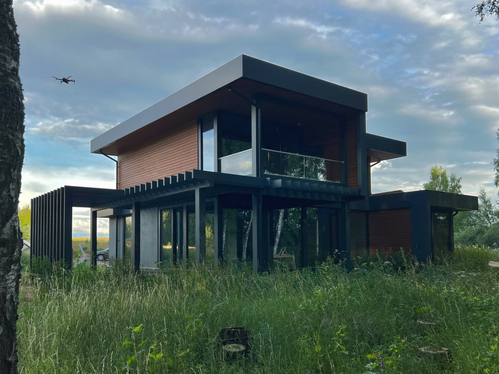 Обложка проекта: Двухэтажный дом с плоской кровлей и панорамным остеклением Flta'n'Wood 280м²