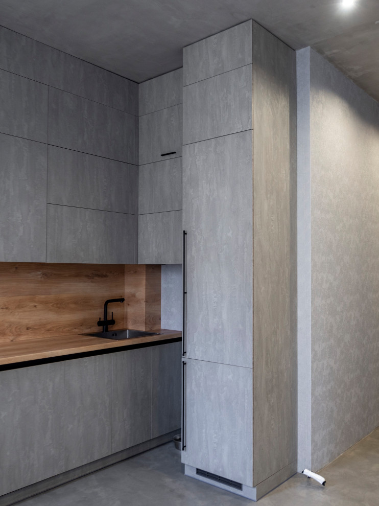 Элегантная минималистичная кухня в сером цвете