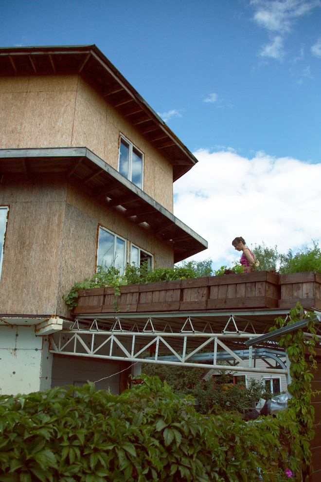 В гостях: Огород на крыше гаража в загородном доме