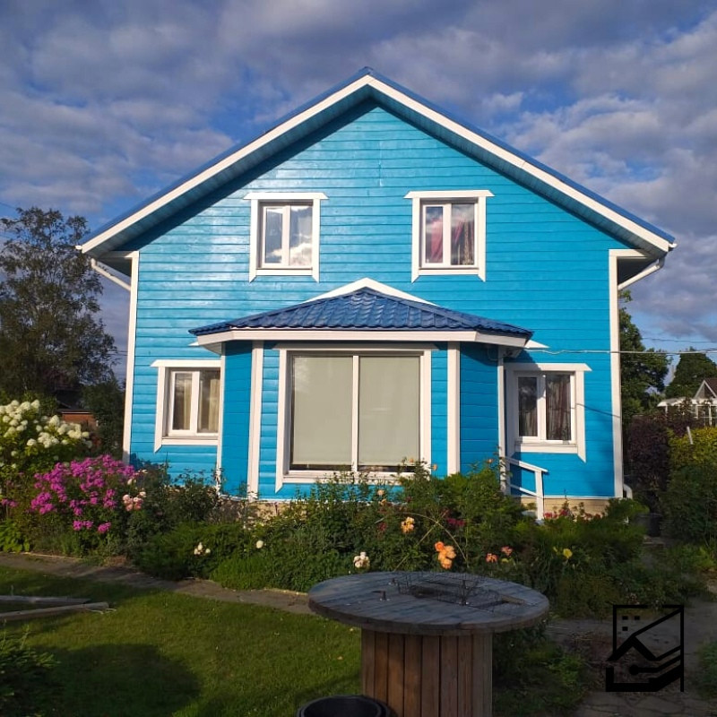 Покраска деревянного дома Tikkurila Vinha