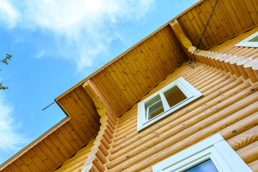 отделка дома из оцилиндрованного бревна