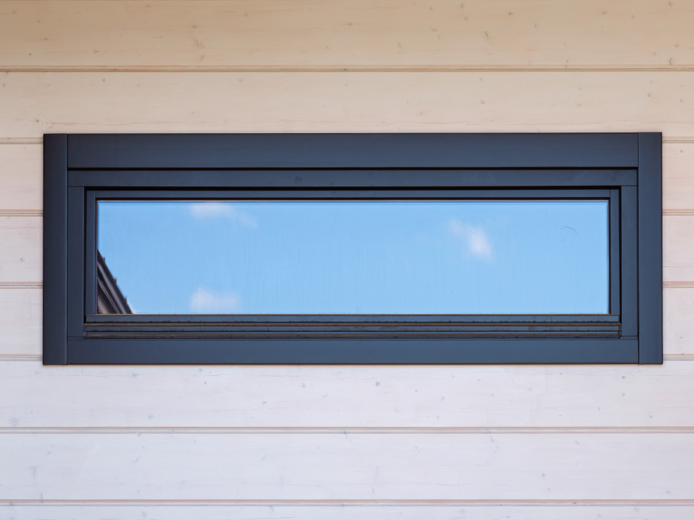 Трапецевидные окна, порталы и входные двери для современного дома