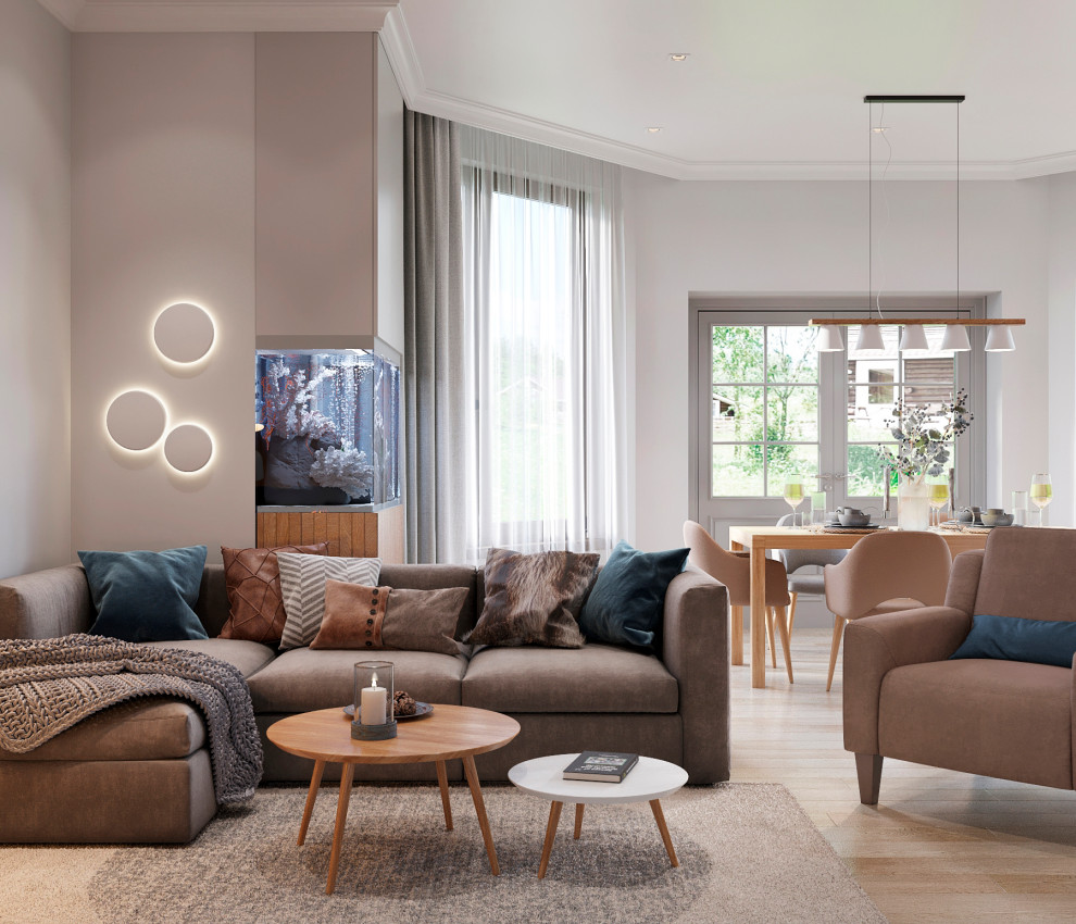 Кухня-гостиная на первом этаже. Вид на диван