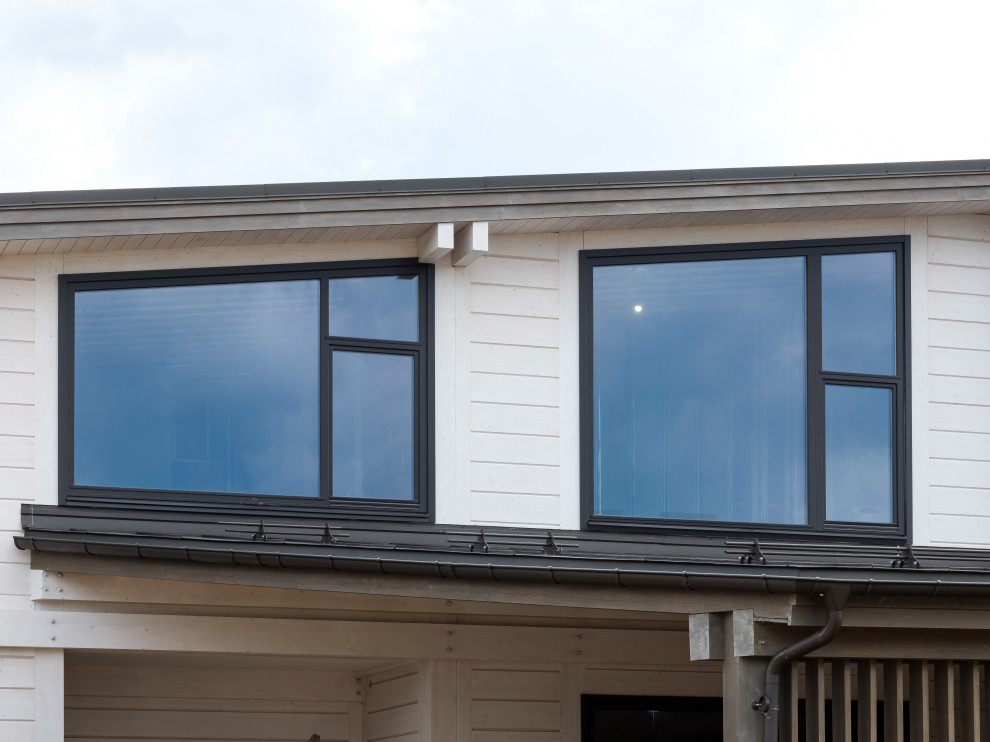 Трапецевидные окна, порталы и входные двери для современного дома