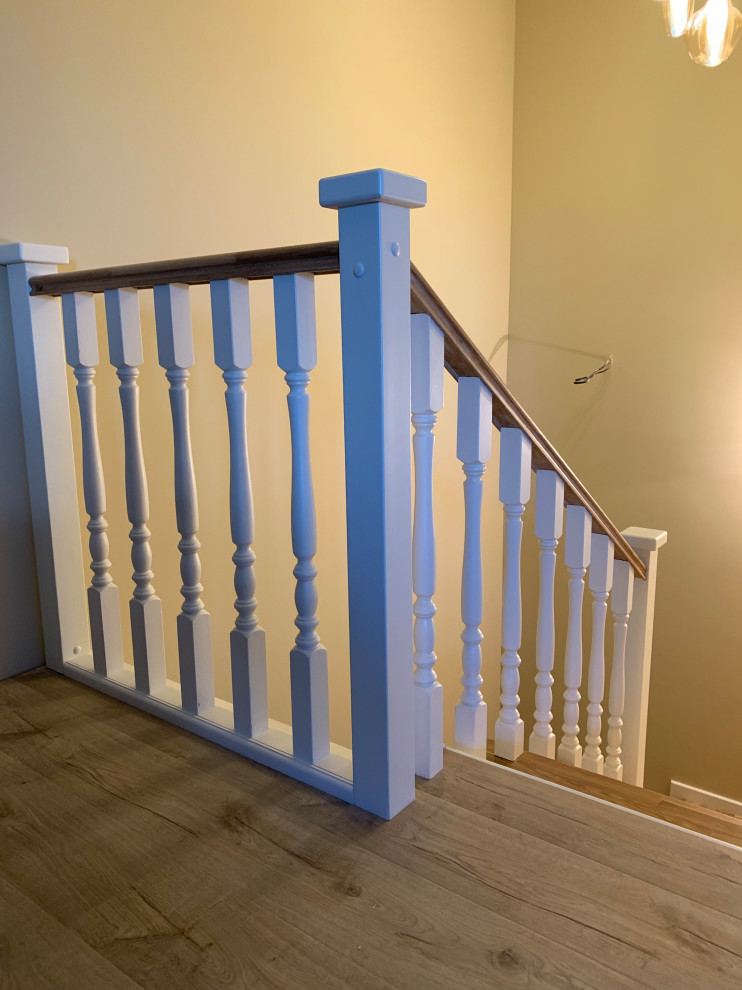 Обшивка бетонной лестницы дубом в таунхаусе ЖК Каскад Парк