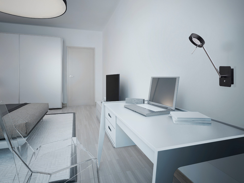 Рабочая зона в спальне в серых тонах