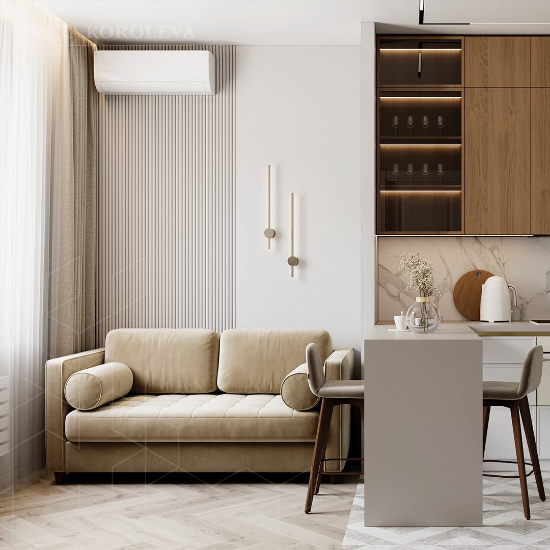 Кухня-гостиная с охристых оттенках с небольшим диваном, барная стойка в кухне-го