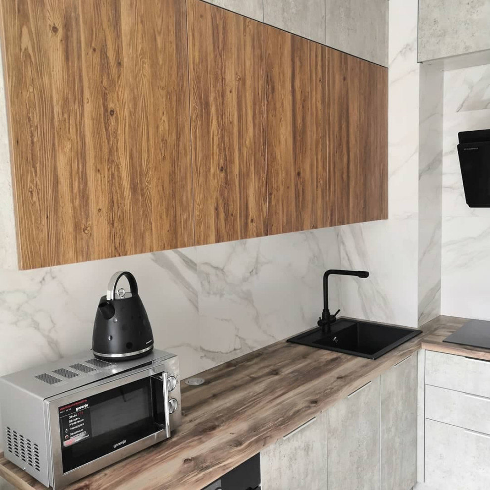 Маленькая угловая кухня для студии в стиле лофт