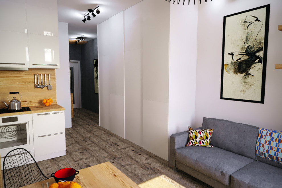 Белый шкаф визуально не нагружает пространство.