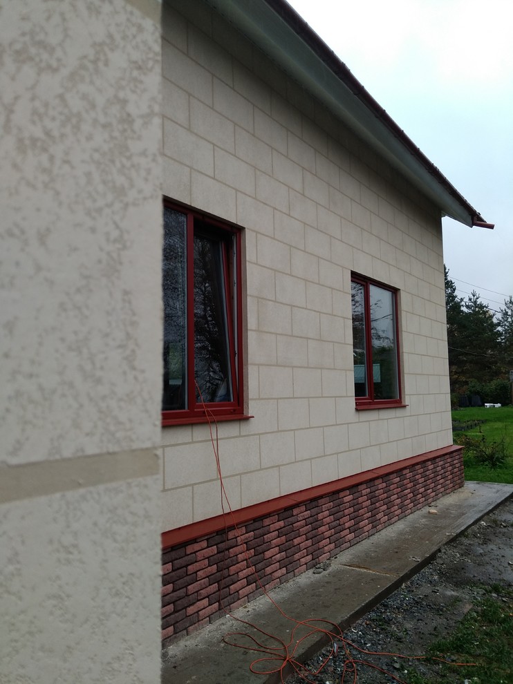 Изготовление фасада из декоративной штукатурки в Кириши