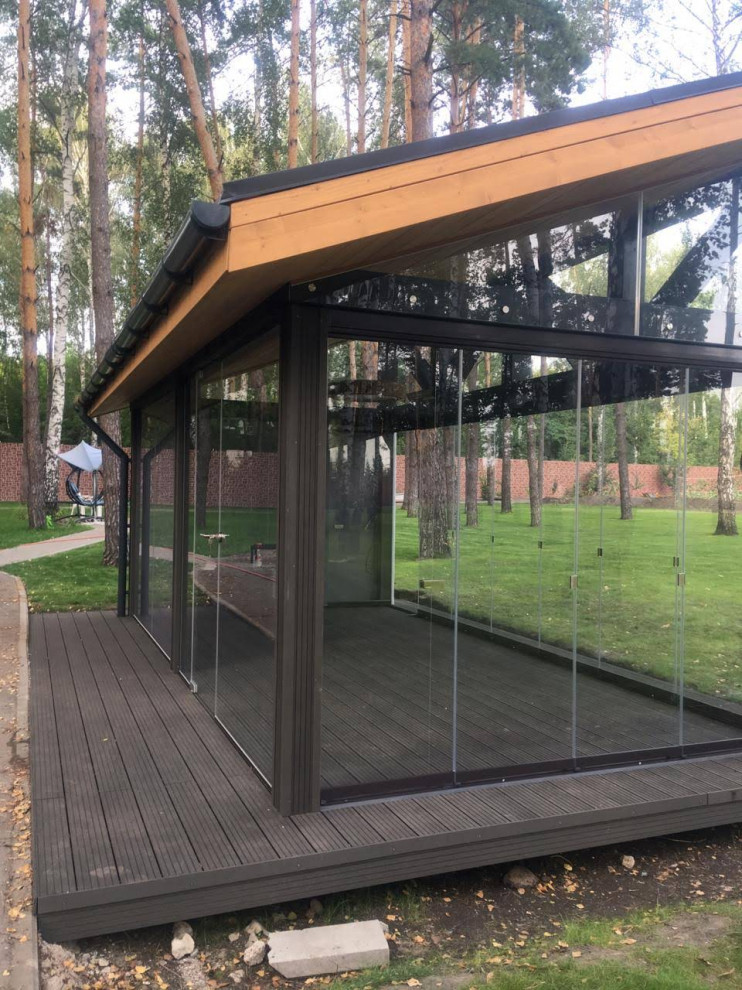 Обложка проекта: Теплая беседка с безрамным раздвижным остеклением