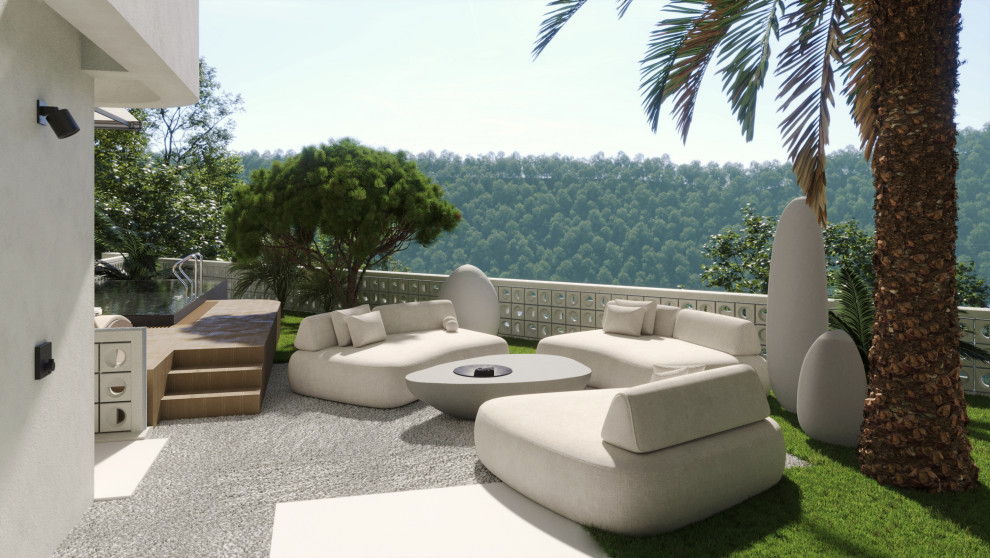 Вид из гостиной на зону отдыха и очаг