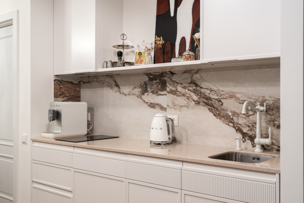 Белая кухня-гостиная в лучших традициях