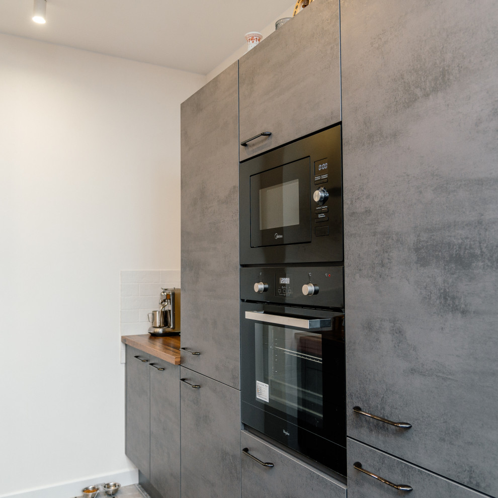 Кухня под бетон с оригинальной барной стойкой