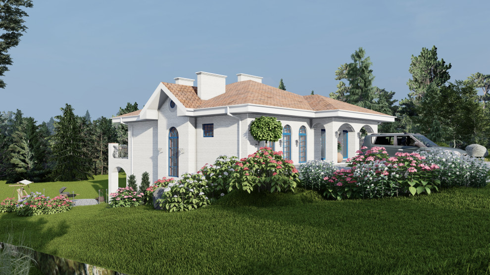 Дом в средиземноморском стиле на участке с уклоном.