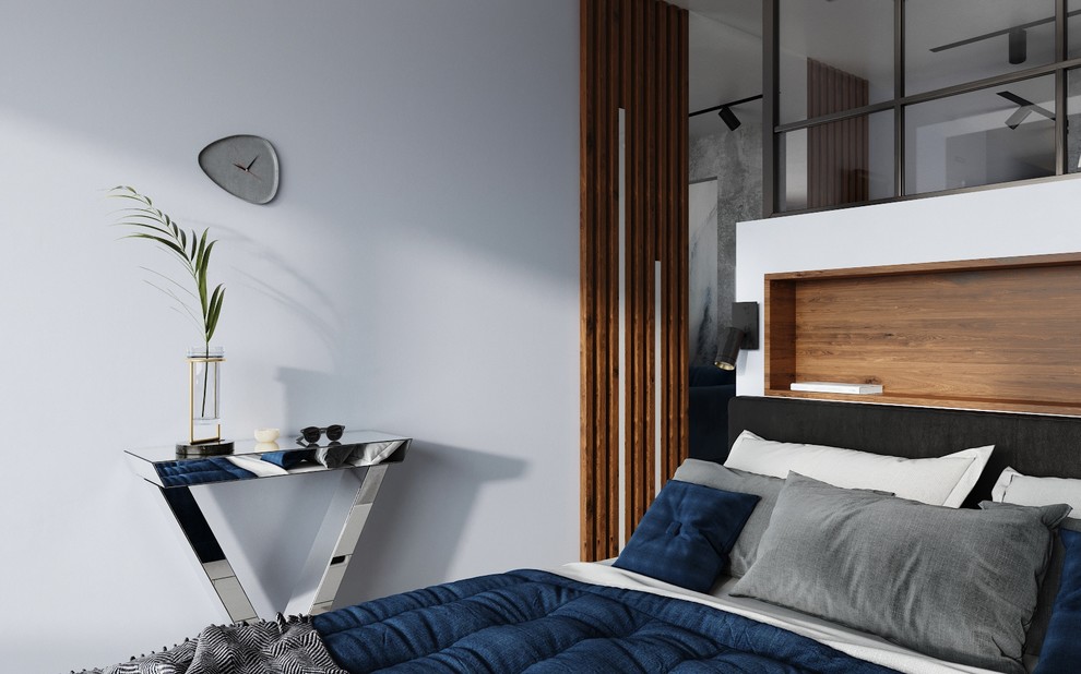 Ниша за изголовьем выполняет роль прикроватной тумбочки.