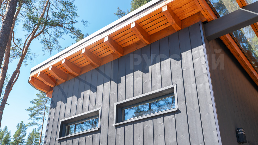 Гостевой дом: фасад из скандинавской доски, рейки из тика и шпонированные панели
